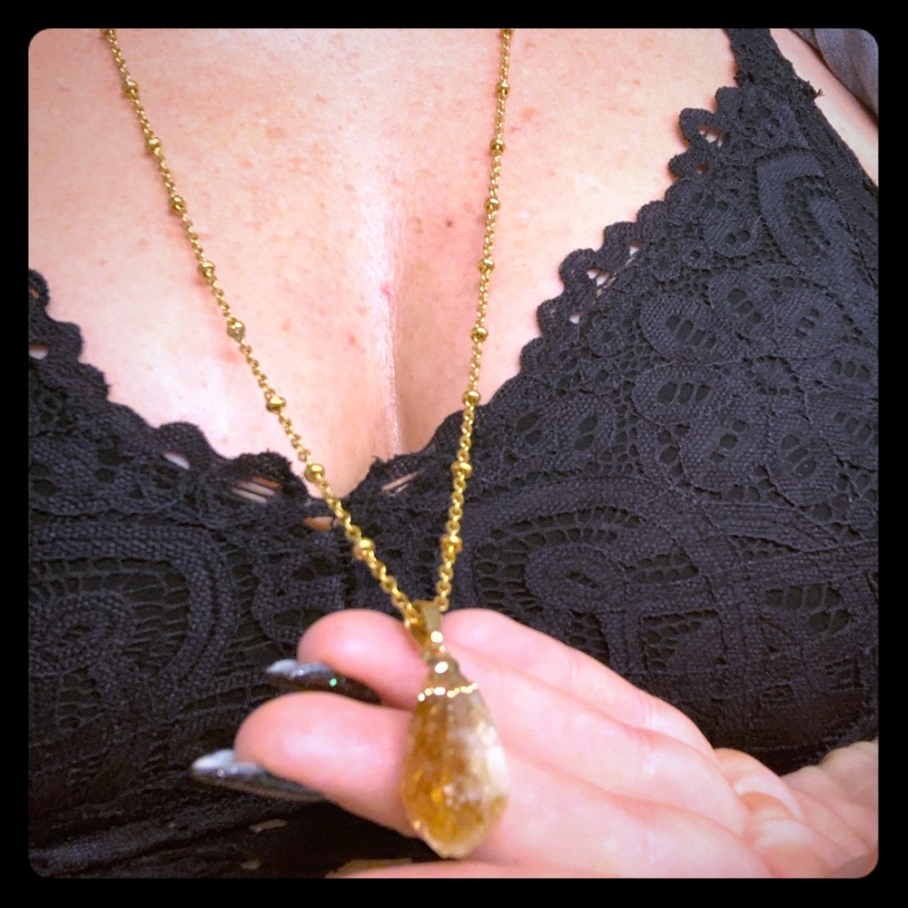 Statement citrine necklace on gold setting